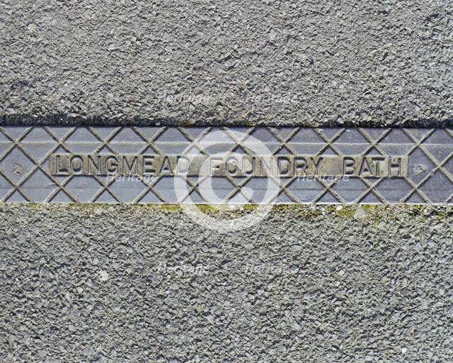 Pavement rainwater gully cover plate made by Longmead Foundry, Bath, Swindon, Wiltshire, 2006. Artist: Peter Williams.