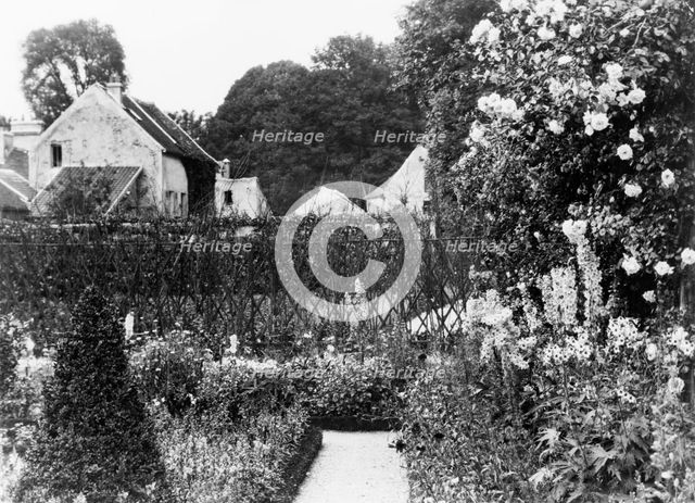 Pavilion Colombe, Mrs. Edith Wharton's villa, St. Brice-sous-Forêt, France, with garden..., 1925. Creator: Frances Benjamin Johnston.