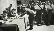 Pay-day Marks-off Life in the Royal Air Force at Regular Intervals 1941. Creator: Charles Brown