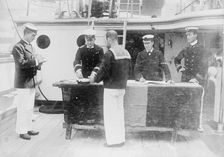 Paying sailors, British Navy, between c1910 and c1915. Creator: Bain News Service