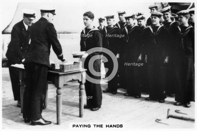 'Paying the hands', 1937. Artist: Unknown