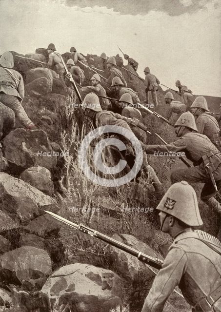'Paardeberg: The Canadians Storming An Outlying Kopje', February 1900, (c1900).  Creator: Thiele & Co.