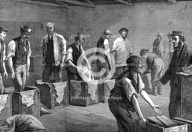 Packing tea in the warehouses of the East & West India Dock Company, London, 1874 Creator: Unknown.