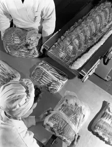 Packing bacon rashers, Danish Bacon Company, Selby, North Yorkshire, 1964. Creator: Michael Walters