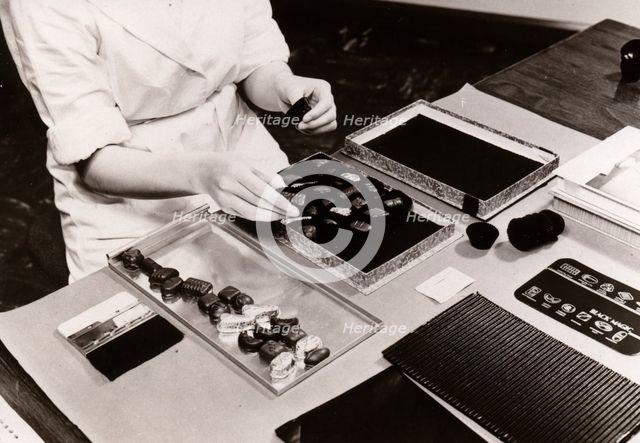 Packing Black Magic gift boxes, 1956. Artist: Unknown
