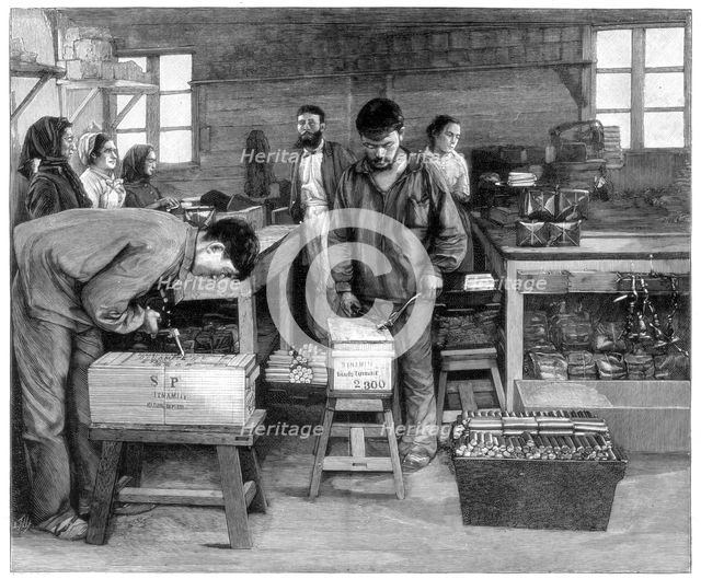 Packing cartridges into boxes at Isleten, near Fluelen, Switzerland, 1893. Artist: Unknown