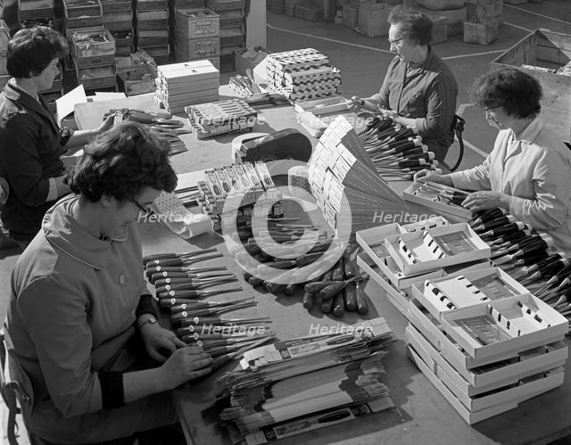 Packing chisels for dispatch, Footprint Tools, Sheffield, South Yorkshire, 1968. Creator: Michael Walters.