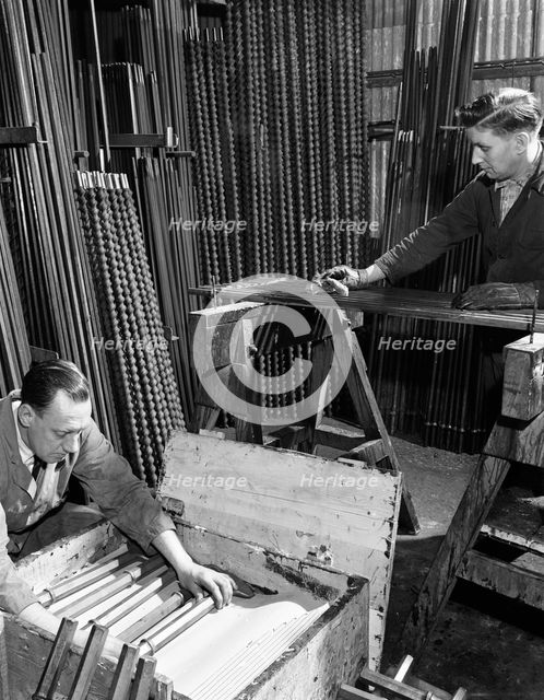 Packing drill bits and pneumatic bits at a steel foundry, Sheffield, South Yorkshire, 1962. Artist: Michael Walters