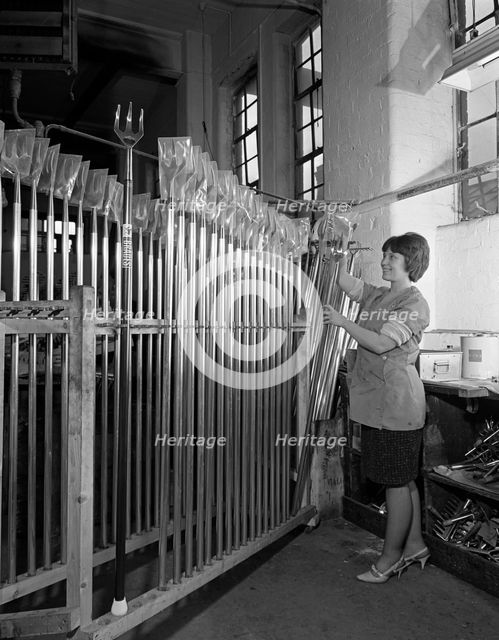 Packing garden forks for dispatch, Brades Tools, Sheffield, South Yorkshire, 1966. Creator: Michael Walters.