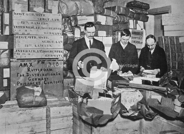 'Packing gifts for despatch to British prisoners in Germany', 1915. Artist: Unknown.