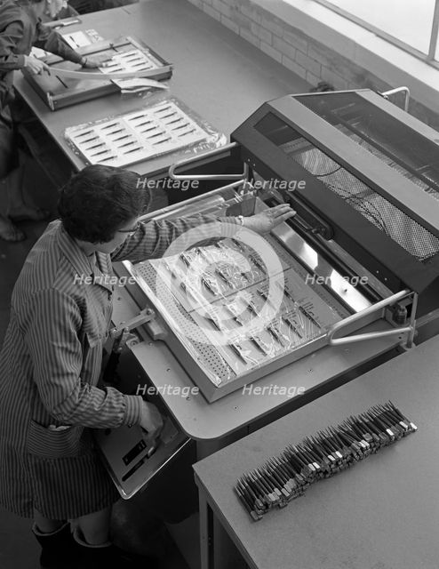 Packing punches, Footprint Tools, Sheffield, South Yorkshire, 1968.   Creator: Michael Walters.