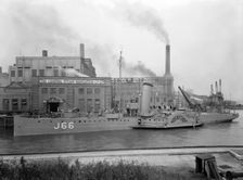 Paddle steamer under arms, Deptford Creek, London, 1940. Creator: Larkin Bros