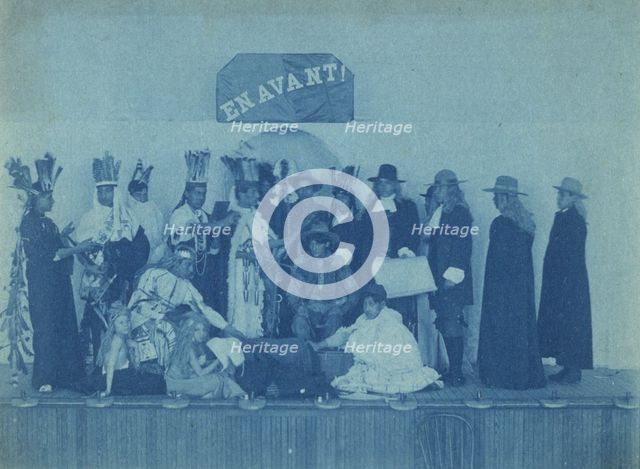 Pageant participants costumed as Pilgrims and Natives, posed beneath a banner "En..., c1880 - 1900. Creator: Frances Benjamin Johnston.