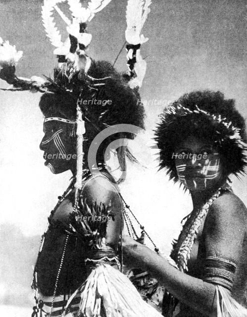 Painted warriors, Papua, New Guinea, 1936.Artist: Sport & General