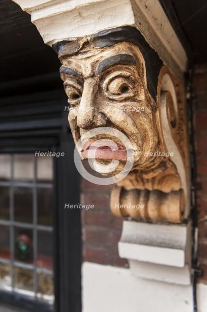 Painted corbel bracket on the Station public house, The Broadway, Stoneleigh, Ewell, Surrey, 2014. Artist: Derek Kendall.