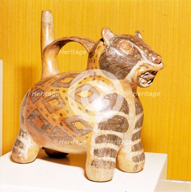 Painted pottery Bridge and Spout vessel in the form of a Jaguar, Tiahuanaco, Peru, 100-600. Artist: Unknown.