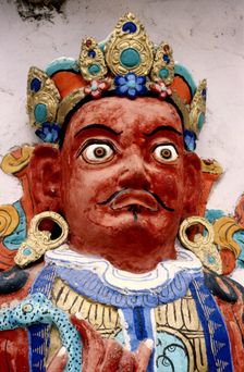 Painted relief of a deity, monastery, Ladakh, India, 1988. Creator: Amanda Waite