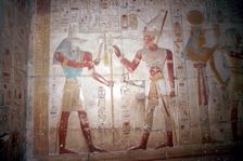 Painted relief of Sethos before Anubis, Temple of Sethos I, Abydos, Egypt, 19th Dynasty, c1280 BC