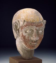 Painted sandstone head of a ba-statue, 1st-3rd century