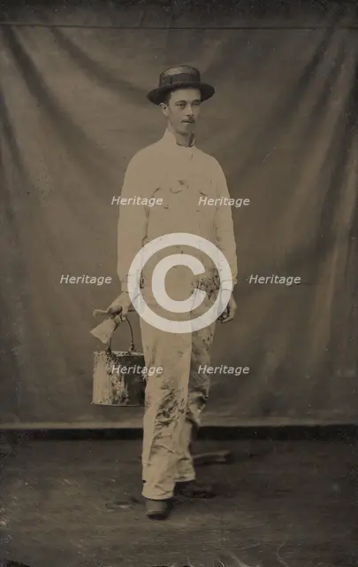 Painter in Paint-spattered Overalls with Brushes and Paint Can, 1870s-80s. Creator: Unknown.