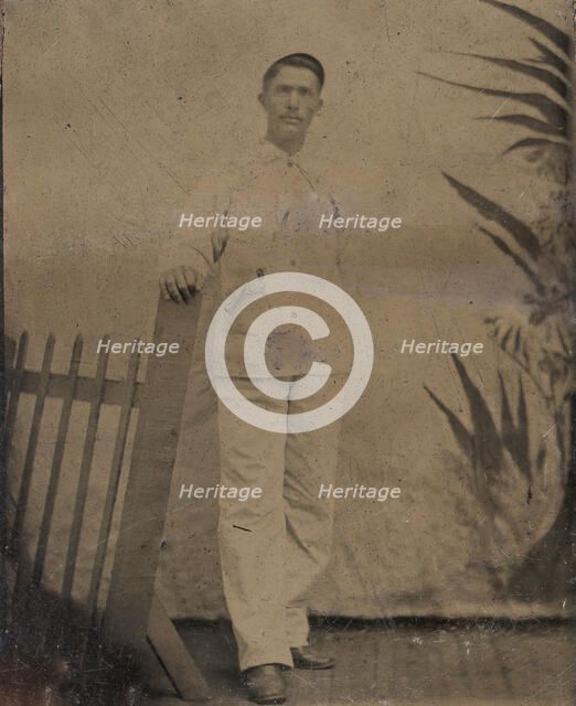 Painter Resting His Hand on Picket Fence, 1860s-80s. Creator: Unknown.