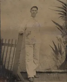 Painter Resting His Hand on Picket Fence, 1860s-80s. Creator: Unknown