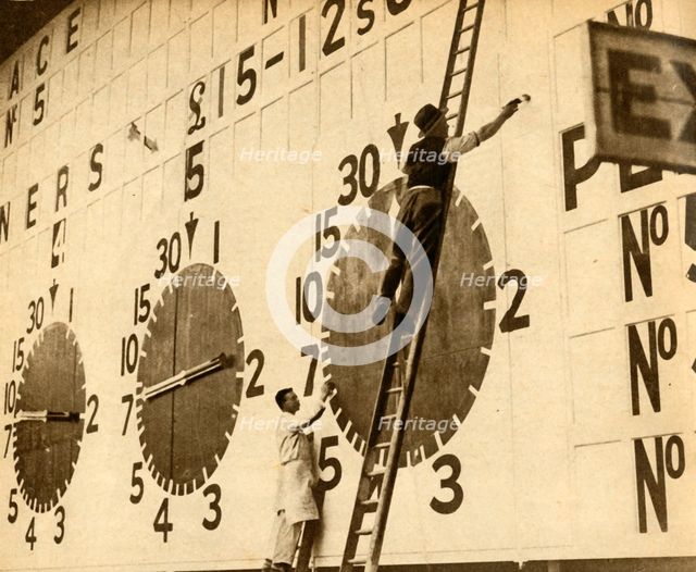 Painters at work on the White City tote, West London, 1932, (1933). Creator: Unknown.