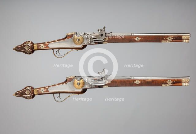 Pair of Wheellock Pistols Made for the Bodyguard of the Prince-Elector of Saxony, German, c1610. Creators: Simon Helbig, Hans Fleischer.