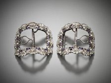 Pair of woman’s shoe buckles, with paste stones, England, c.1780-1785. Creator: Unknown