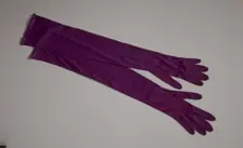 Pair of arm length purple gloves from Mae's Millinery Shop, 1941-1994. Creator: Van Raalte