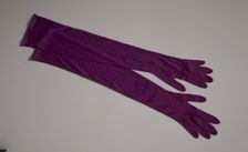 Pair of arm length purple gloves from Mae's Millinery Shop, 1941-1994. Creator: Van Raalte
