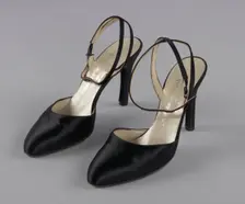 Pair of black stiletto heel shoes by Charles Jourdan from Mae's Millinery Shop, 1941-1994. Creator: Charles Jourdan