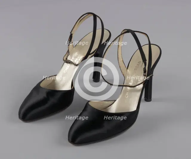 Pair of black stiletto heel shoes by Charles Jourdan from Mae's Millinery Shop, 1941-1994. Creator: Charles Jourdan.