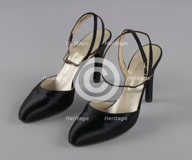 Pair of black stiletto heel shoes by Charles Jourdan from Mae's Millinery Shop, 1941-1994. Creator: Charles Jourdan.