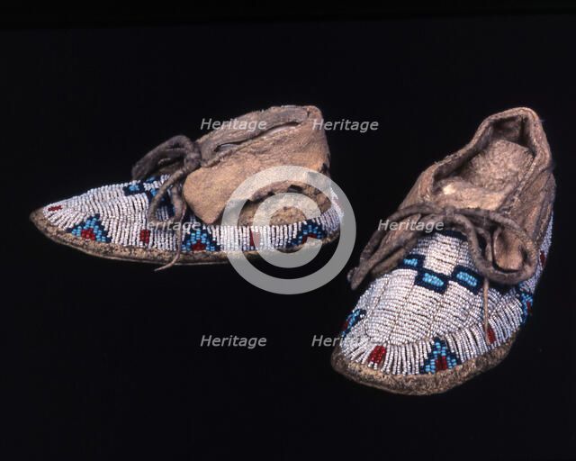 Pair of child's moccasins, Plains, possibly Sioux, c. 1885. Creator: Unknown.
