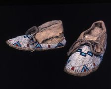 Pair of child's moccasins, Plains, possibly Sioux, c. 1885. Creator: Unknown