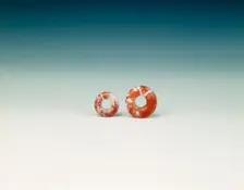 Pair of cornelian flat bi-discs, neolithic, Liangzhu culture, China, c3400-2250 BC. Creator: Unknown