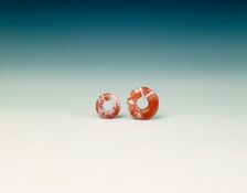 Pair of cornelian flat bi-discs, neolithic, Liangzhu culture, China, c3400-2250 BC. Creator: Unknown