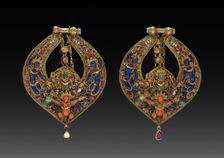 Pair of Deity Earrings with Vishnu on Garuda (front) and chepu (monster mask) (back), 1600s or 1700s Creator: Unknown