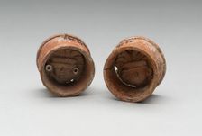 Pair of Ear Plugs with Face of Figure in Interior, A.D. 300/750 A.D. Creator: Unknown