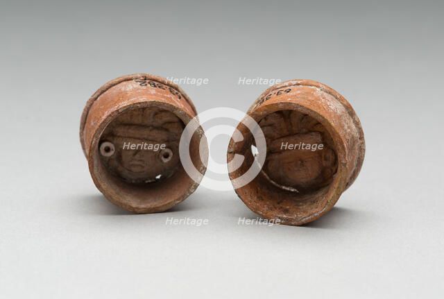 Pair of Ear Plugs with Face of Figure in Interior, A.D. 300/750 A.D. Creator: Unknown.