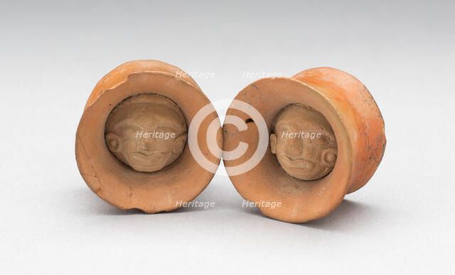 Pair of Earspools with Face in Interior, Possibly AD 450/1000. Creator: Unknown.