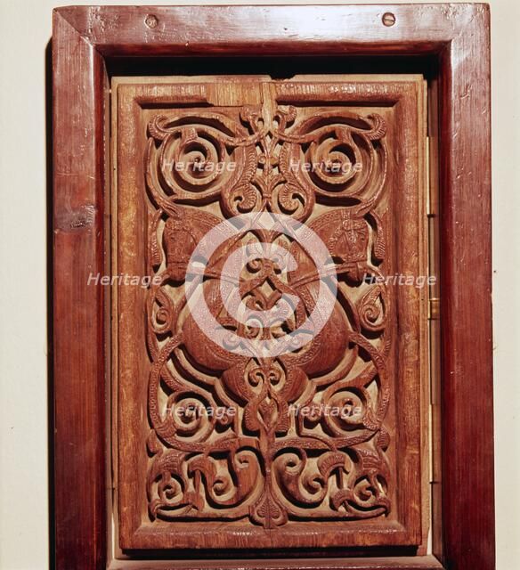 Pair of horses heads on Teak Door-Panel, Egypt, Fatimid Period, 11th century. Artist: Unknown.