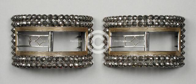 Pair of man’s steel and gilt wire shoe buckles, England, c.1777 and c.1785. Creator: Unknown.