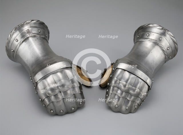Pair of Mitten Gauntlets, Flanders, c. 1520 with modern restorations. Creator: Unknown.