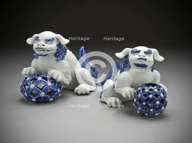 Pair of Okimono in the Form of Chinese Lions on Pierced Balls, 19th century. Creator: Unknown.