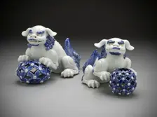 Pair of Okimono in the Form of Chinese Lions on Pierced Balls, 19th century. Creator: Unknown