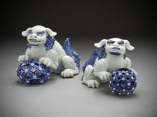 Pair of Okimono in the Form of Chinese Lions on Pierced Balls, 19th century. Creator: Unknown