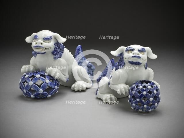 Pair of Okimono in the Form of Chinese Lions on Pierced Balls, 19th century. Creator: Unknown.