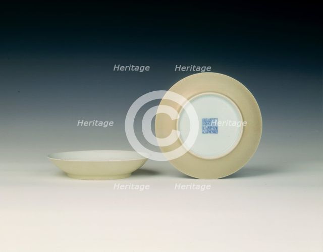 Pair of rice yellow-backed saucers, Qing dynasty, Jiaqing period, China, 1796-1820. Artist: Unknown